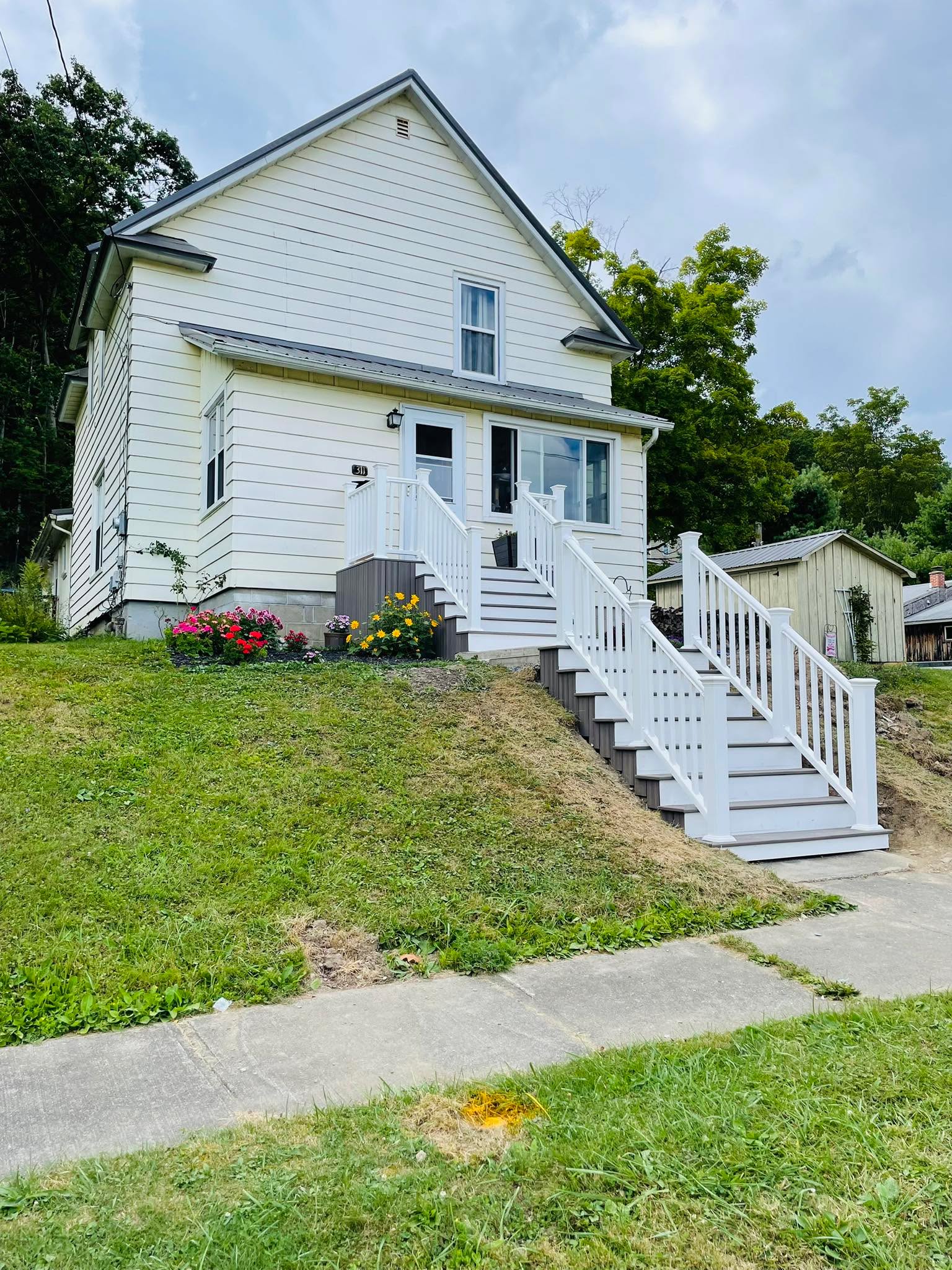 Update #2: old, crumbling cement stairs gone and new, beautiful composite stairs in! 

Now we (Darrick) get to landscape. 😊

We cannot say enough good things about NAG Services! We’ve already booked a few more projects and we highly recommend Todd. He’s professional, trustworthy, and very reliable! Reach out for your home project needs, and tell him the Seeley’s sent you. 🏡